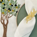 Olive tree gold napkin ring and placemat